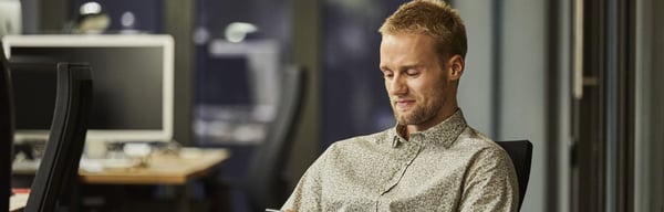 man looking at phone