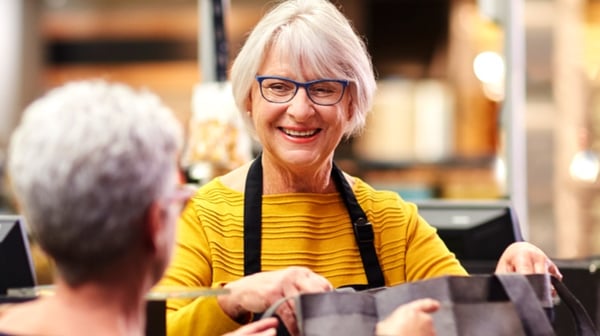Woman packing shopping bags