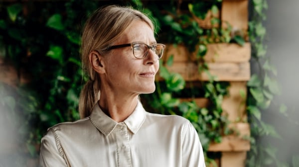 Woman staring into distance